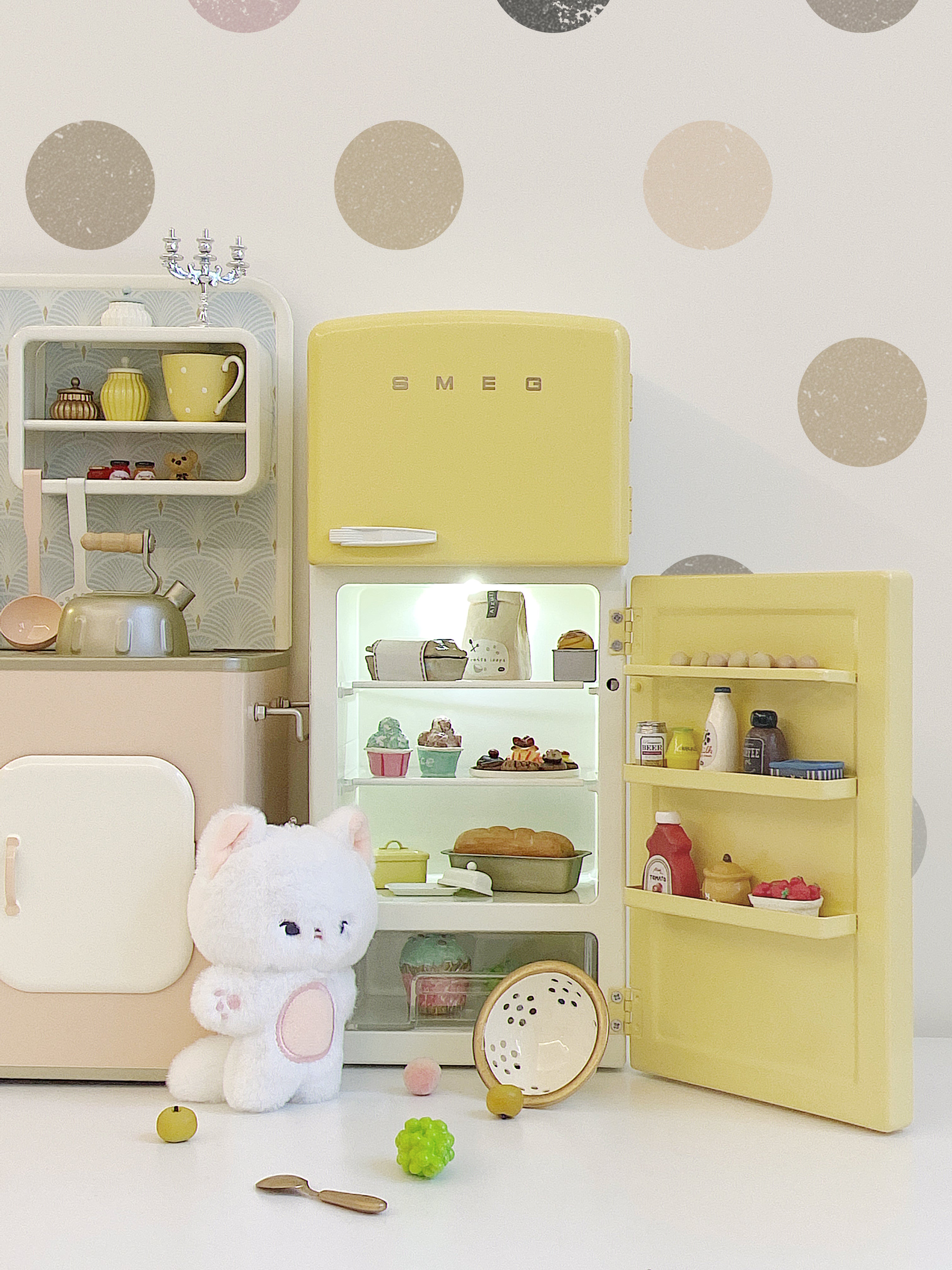 Open yellow refrigerator in a 1:6 kitchen scene with plush figure, dishes and food props not included